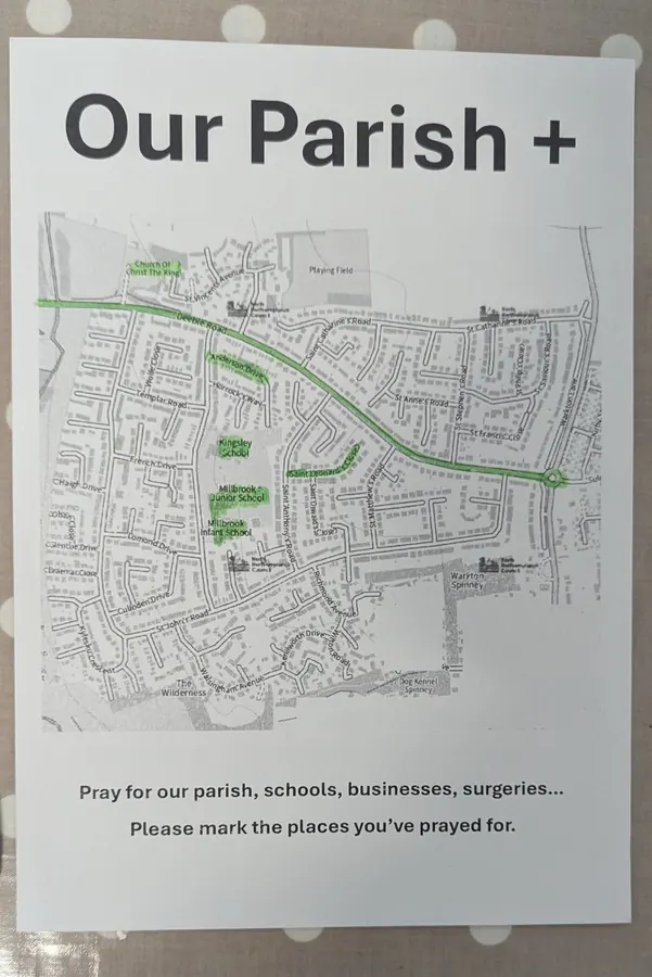 Printed map titled Our Parish plus, with roads and schools highlighted in green